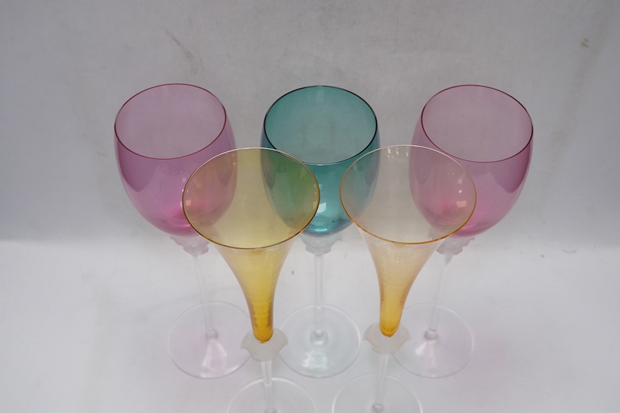 Five boxed Rosenthal for Versace Medusa head glasses; three wine glasses and two champagne flutes in various colours, 30cm high. Condition - good.